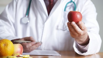 Doctor Giving Advice On Healthy Diet